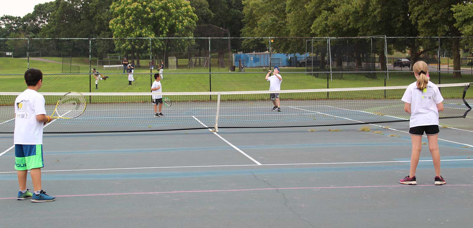 Kids Learn and Play Tennis with Friends and Peers - Suffolk County Junior  Tennis League